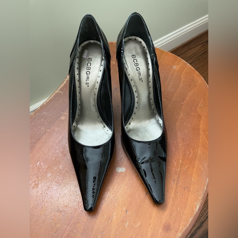 BCBGirls black patent leather pumps